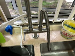 Plumbing layout in modern Puchong kitchen for efficient workflow